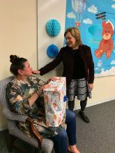 Aileen opening Dr. Gudas' gift!