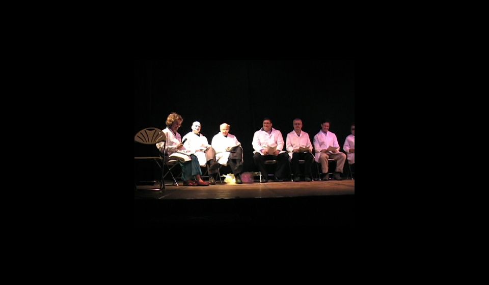 Ceremony attendees on the left of the stage